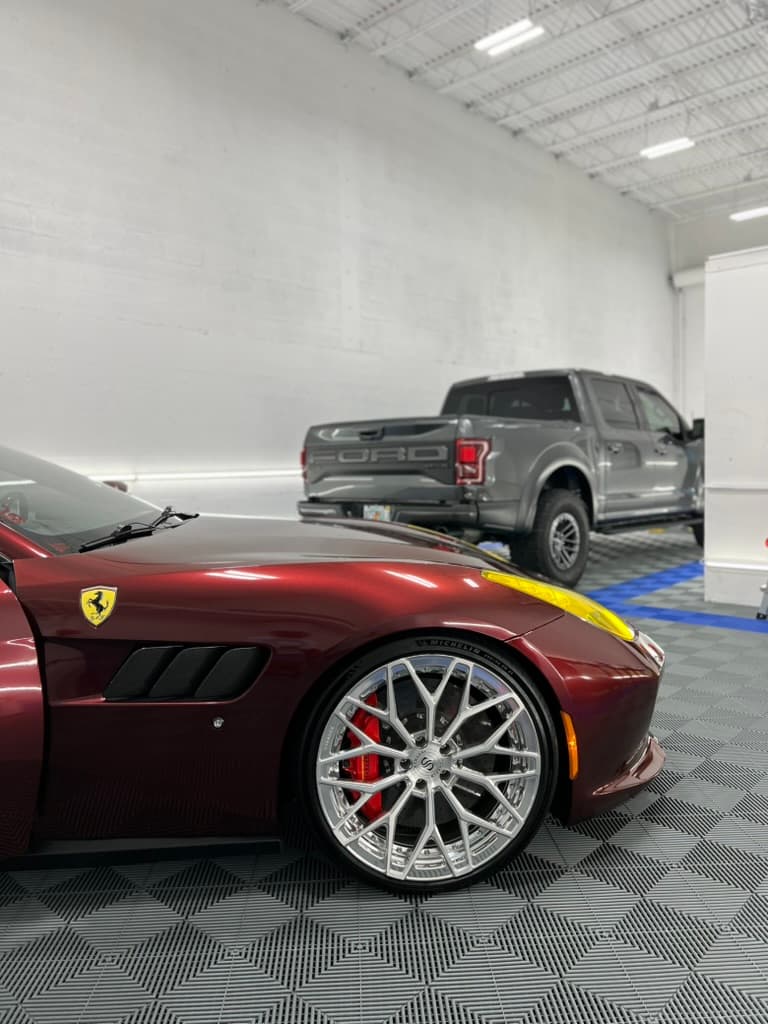 Ferrari GTC4Lusso alongside a Raptor — two very different builds, same attention to detail